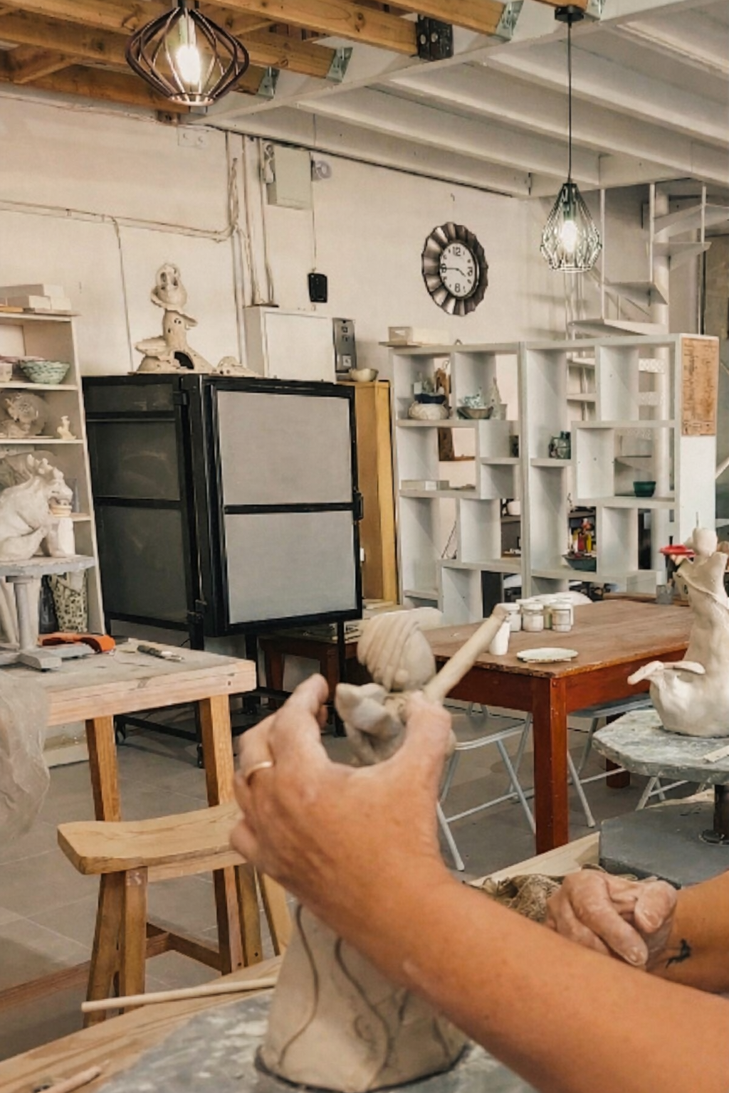 Pottery hands working with clay